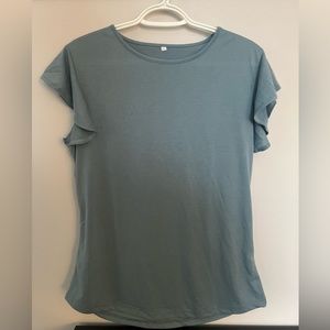 Extra large teal shirt. Never worn.